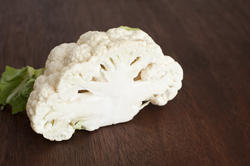 17235   Close up of halved cauliflower head on bench