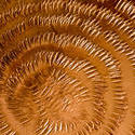 17760   Beaten circular pattern on sheet metal copper
