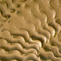 17766   Wavy undulating pattern pressed into brass