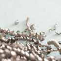 17747   Close up of shaved metal swarf on plain background