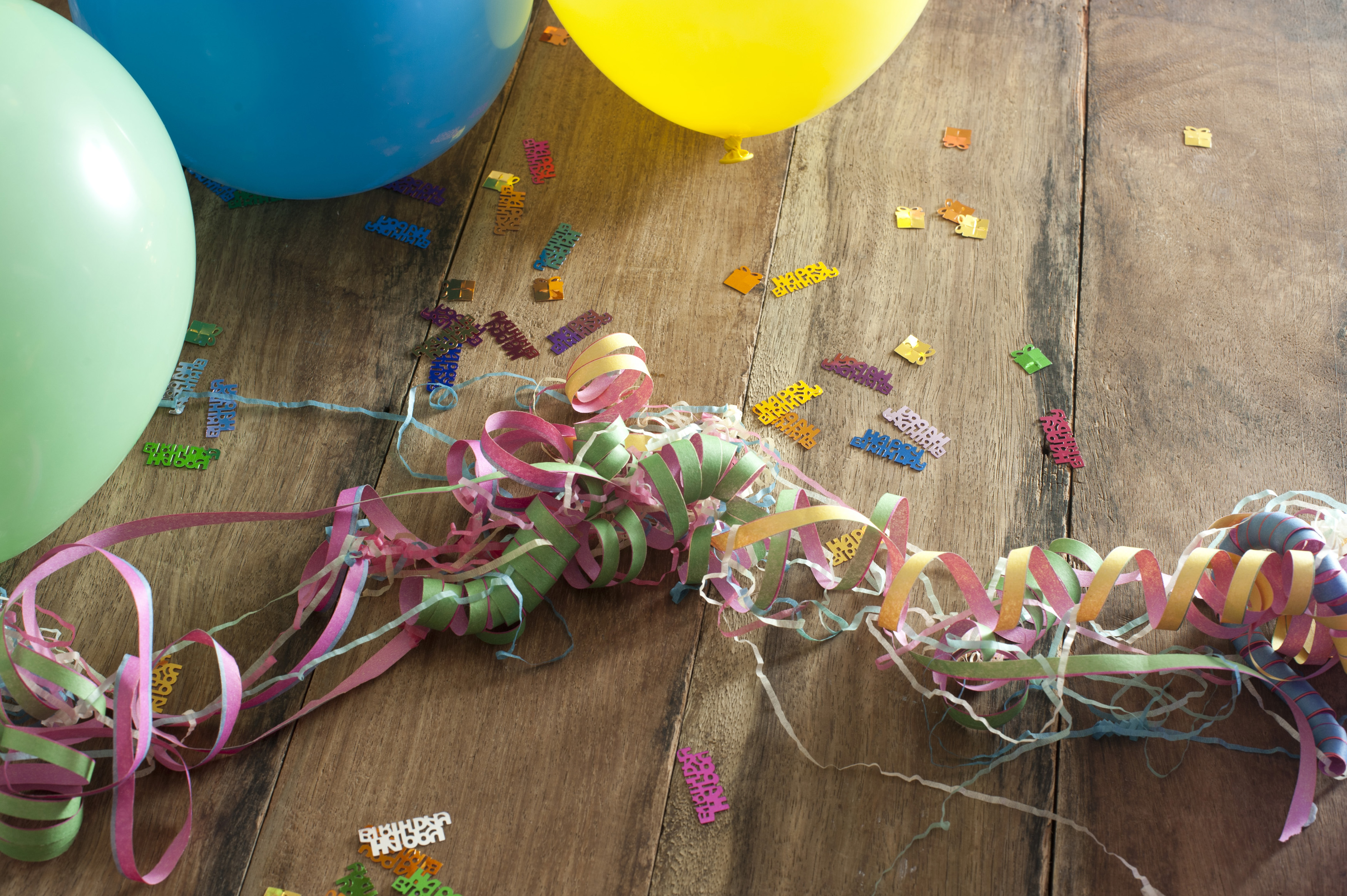 Free Stock Photo 11469 Birthday Party Decorations on Wooden Table |  freeimageslive