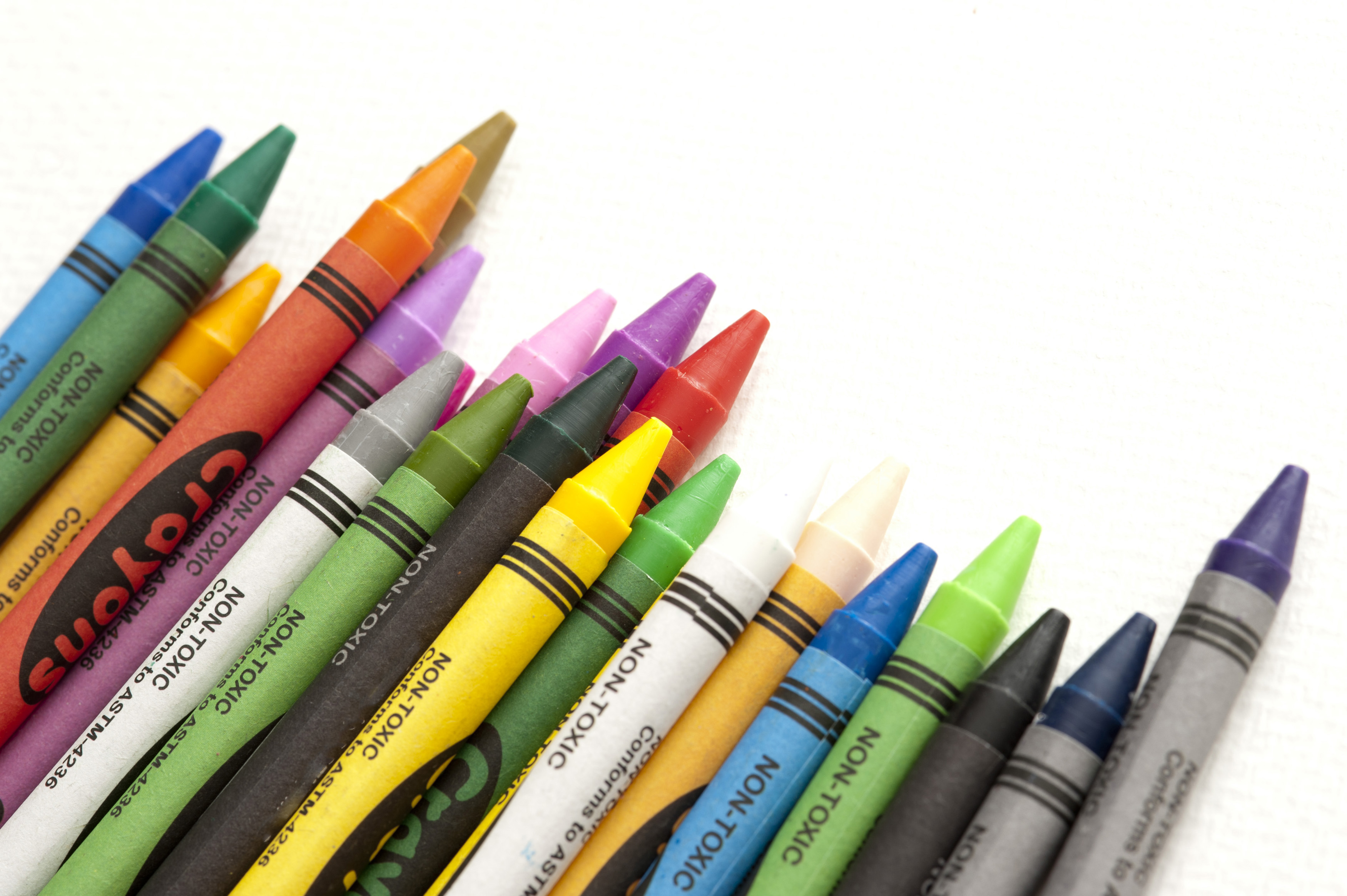 Crayons. Primary and secondary colored crayons isolated on a white