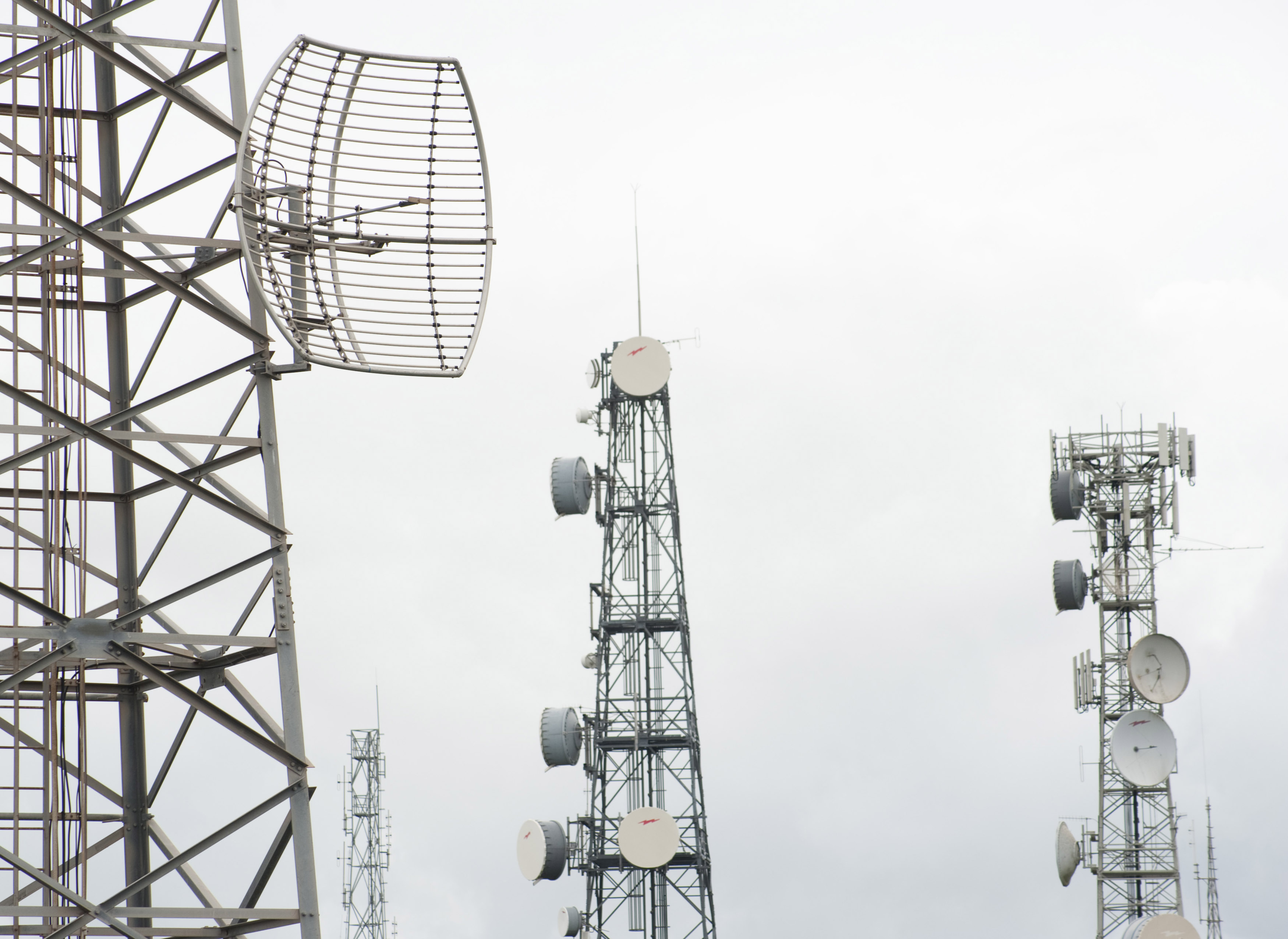 Free Stock Photo 13782 Four telecoms communication masts | freeimageslive